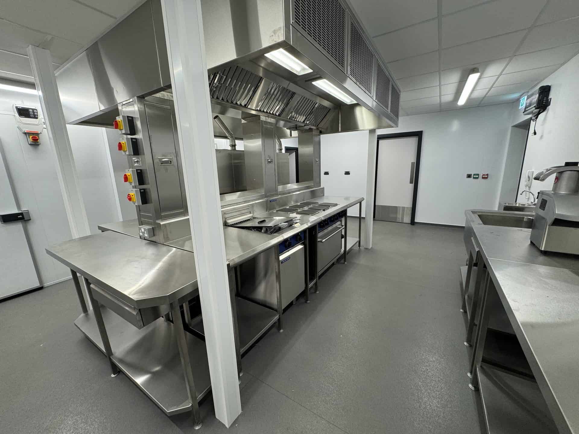 Blue Seal cooking suite beneath the island extraction canopy