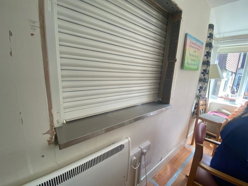 Cedarmore Housing Association, Bromley — servery with roller shutter