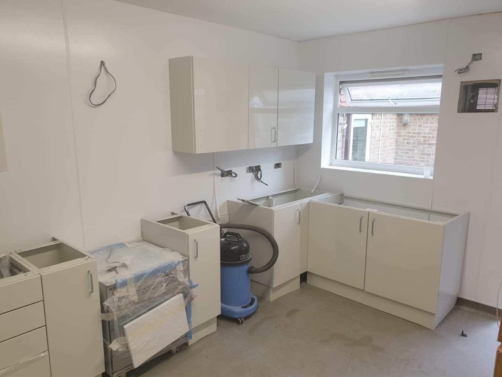 Cedarmore Housing Association, Bromley — steel units being fitted