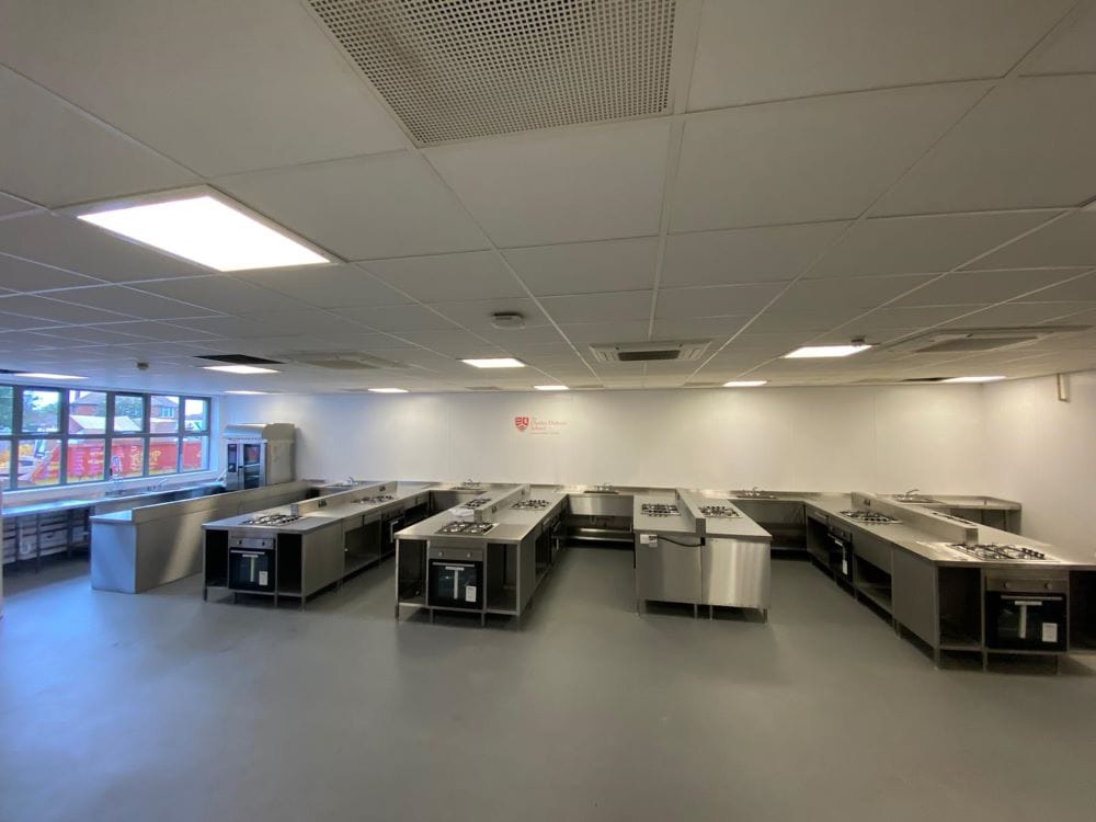 Bespoke stainless steel student workstations at Charles Dickens School, Broadstairs
