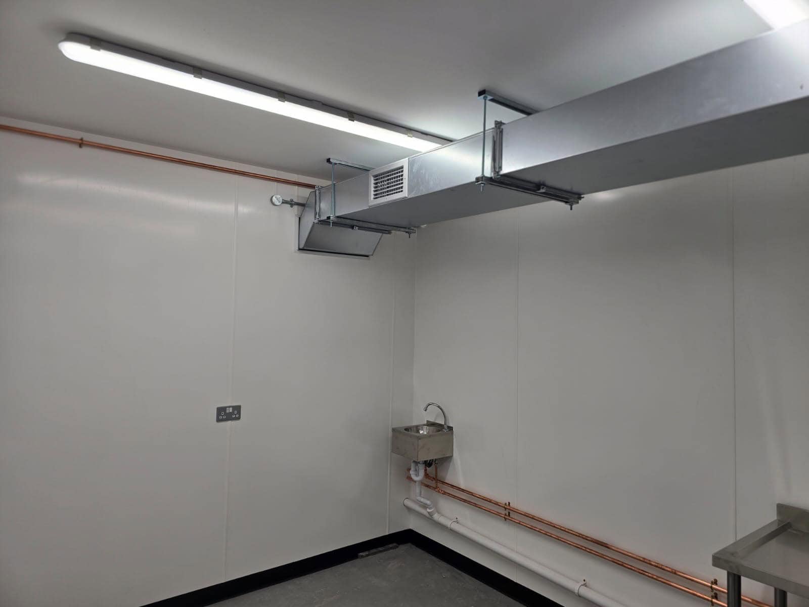 Condimaniac Chatham — supply air ductwork in the spice room