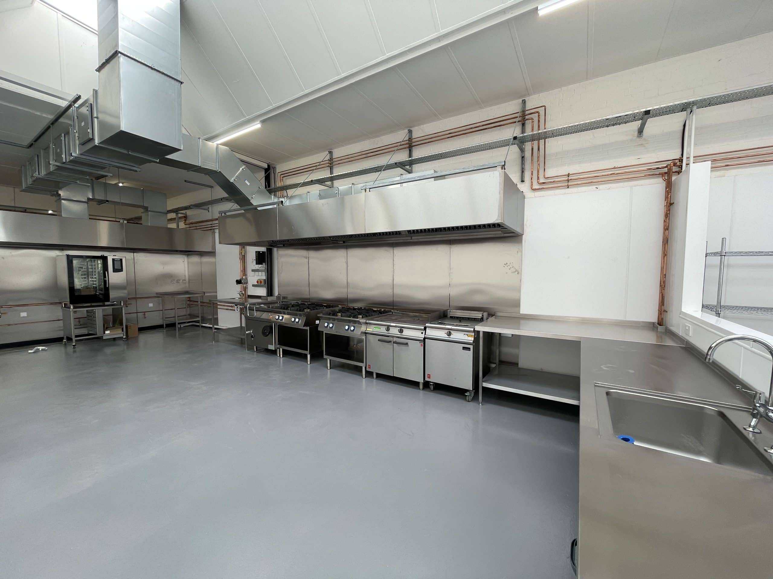 Commercial cooking area at Finish and Feast CPU, Croydon