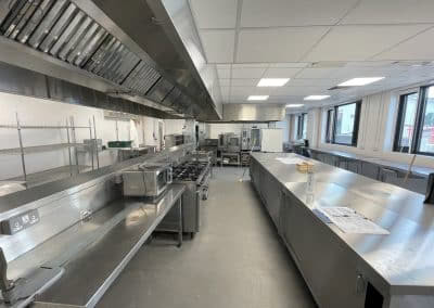 Full kitchen overview of a completed teaching kitchen at Folkestone College
