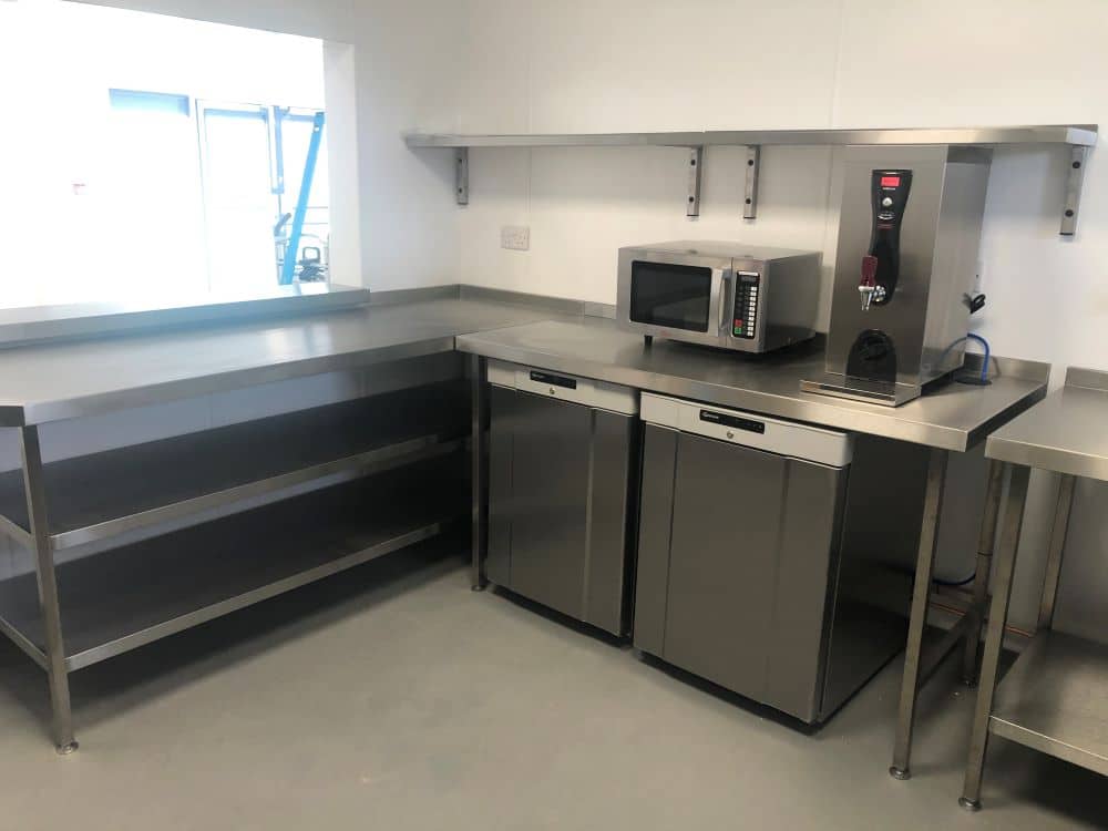 Stainless steel prep tables and undercounter fridges at Herne Bay Golf Club