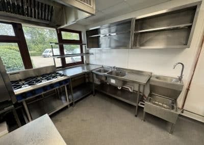 Sink run and prep area in the refurbished school kitchen at Herne Bay