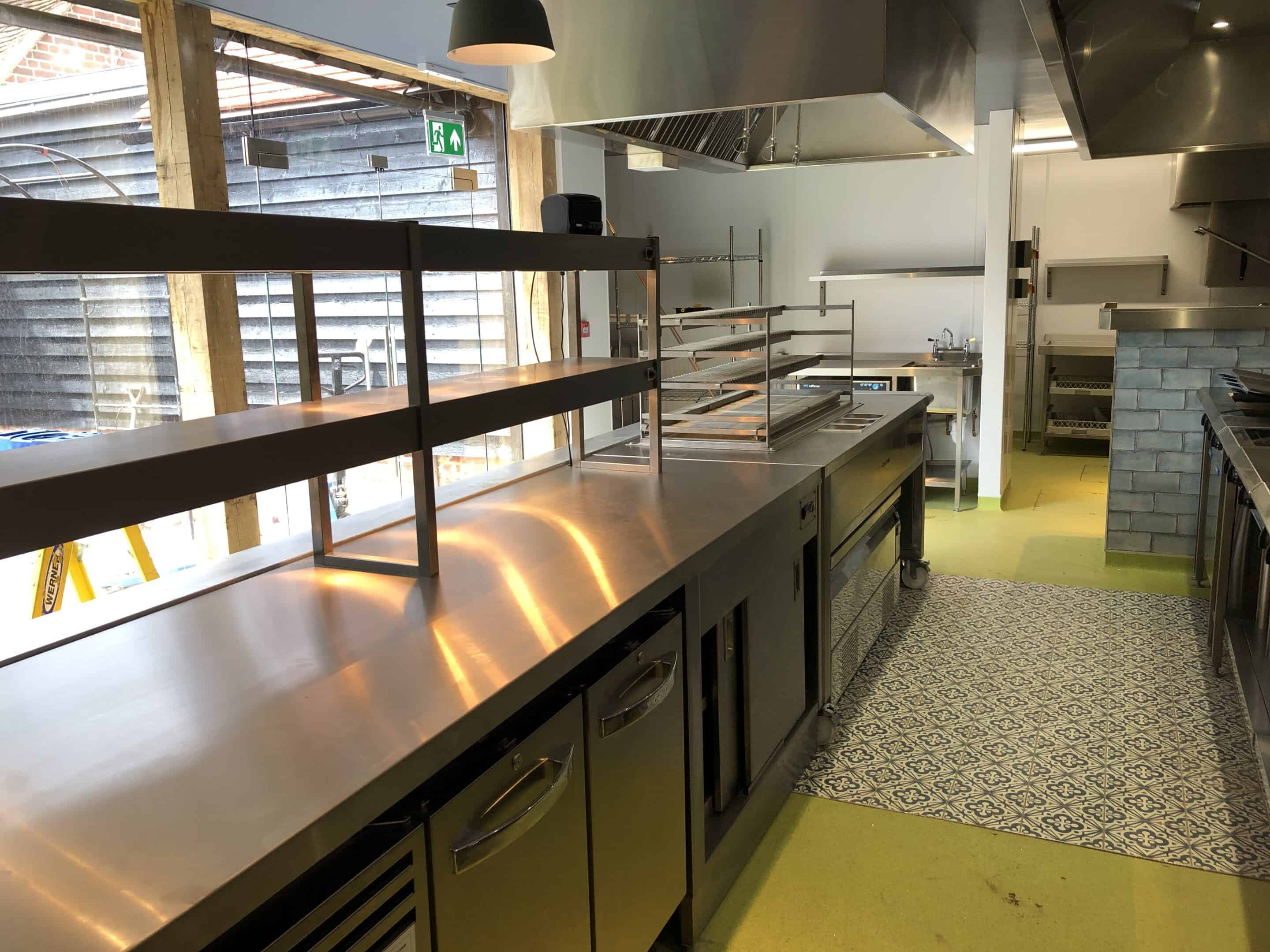 Servery pass in the barn kitchen at The Kings Arms, Elham