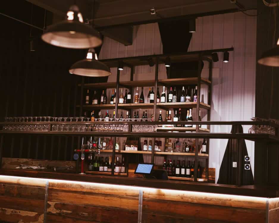 Bar area with wine display at Macknade Fine Foods, Ashford