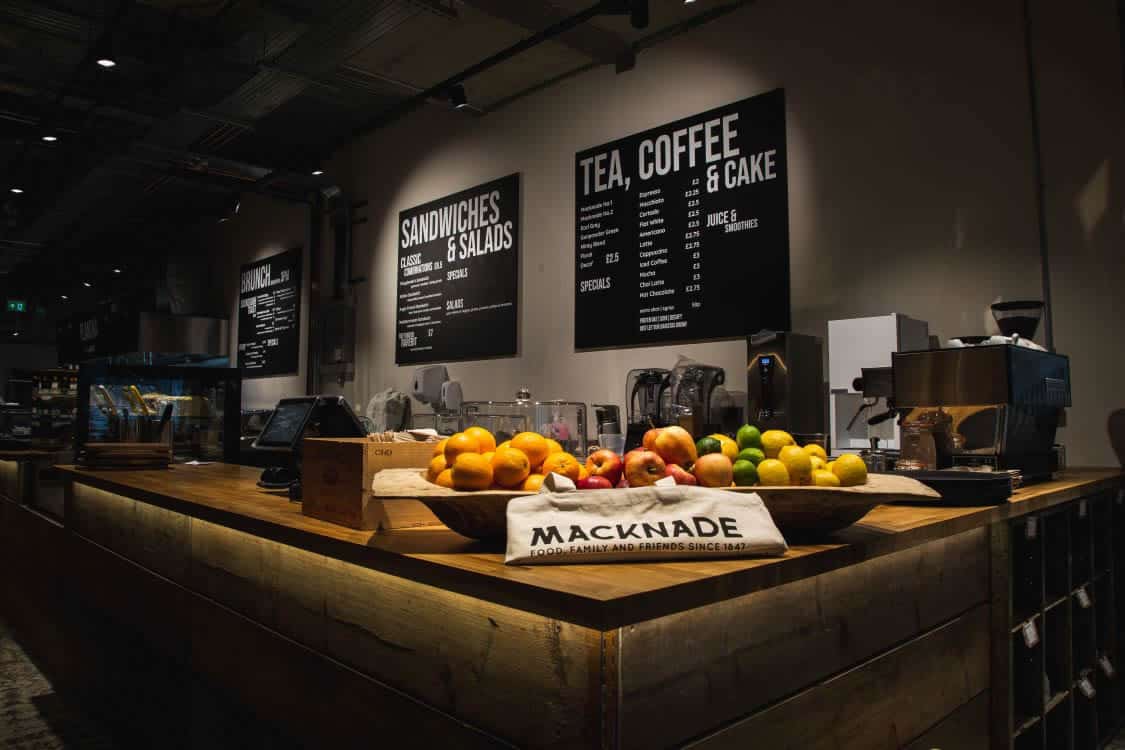 Service counter and coffee station at Macknade Fine Foods, Ashford