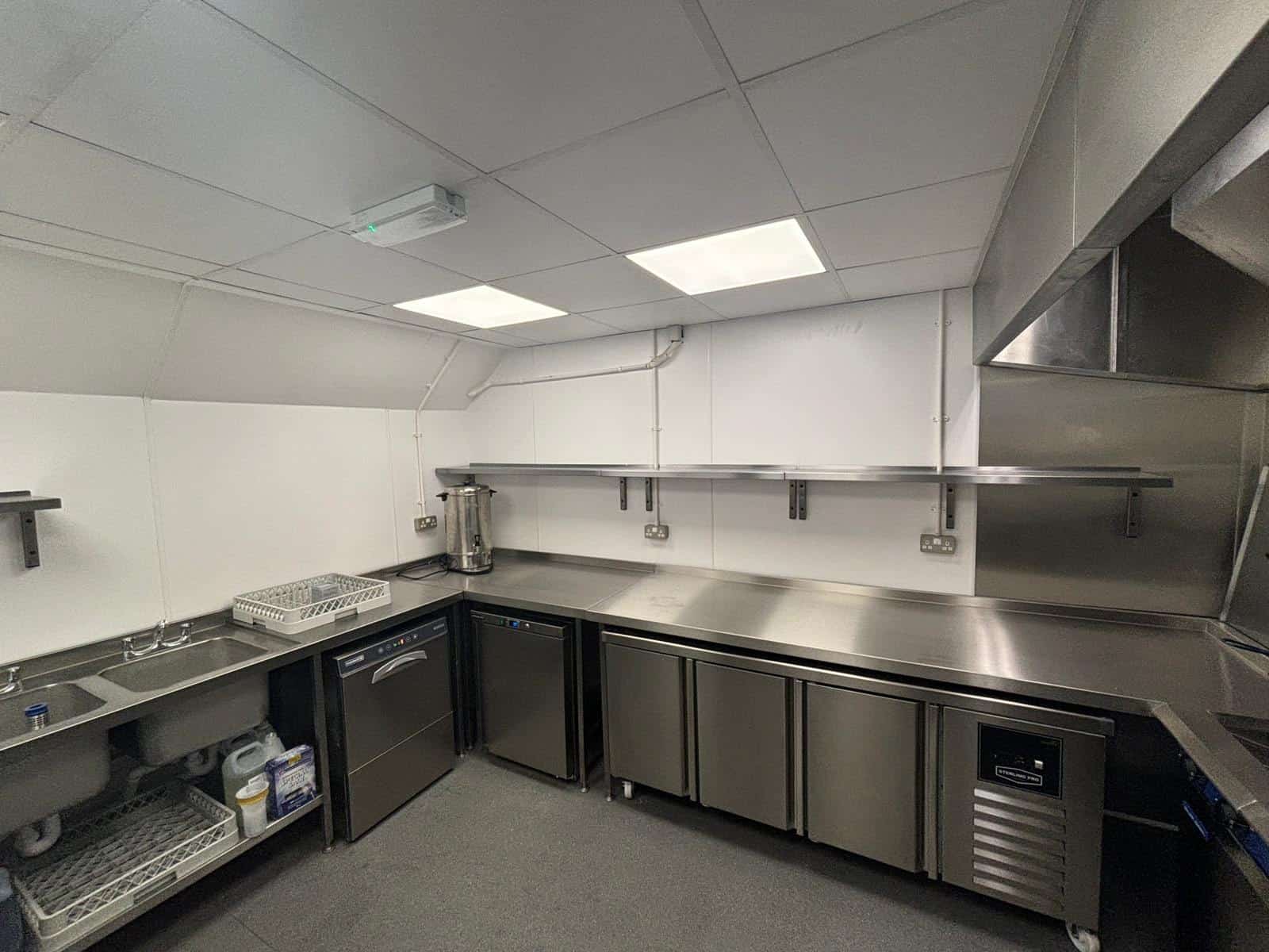 Bespoke stainless steel prep benches at Marden Village Club