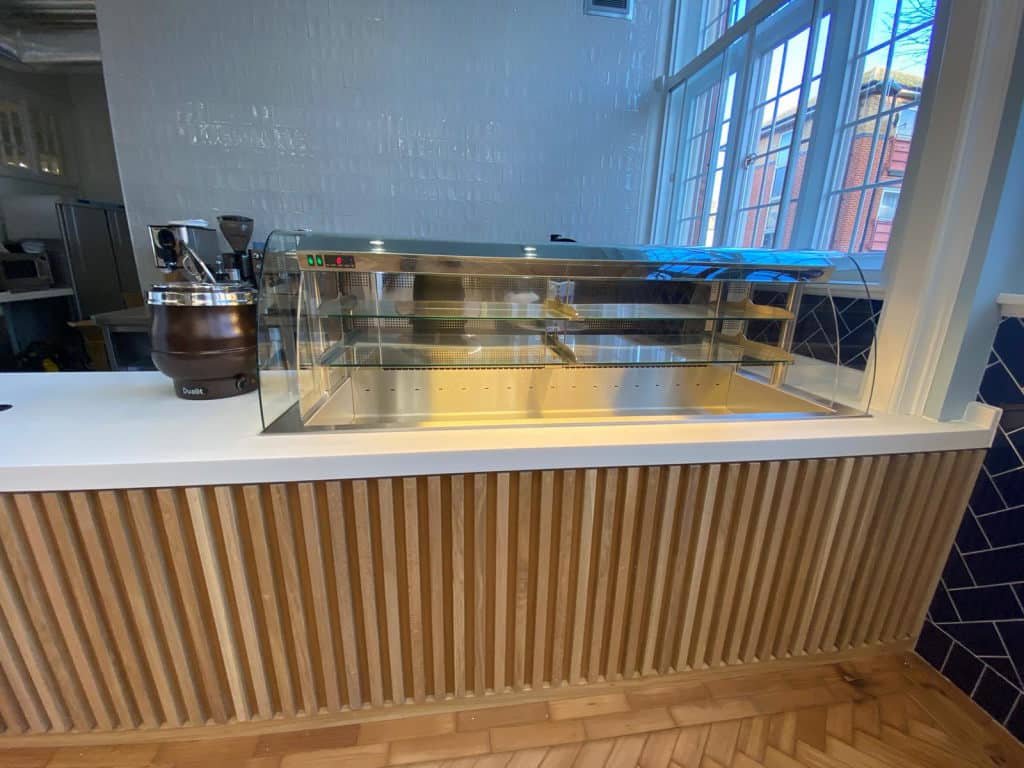 Heated display cabinet at Plumstead Library café, London