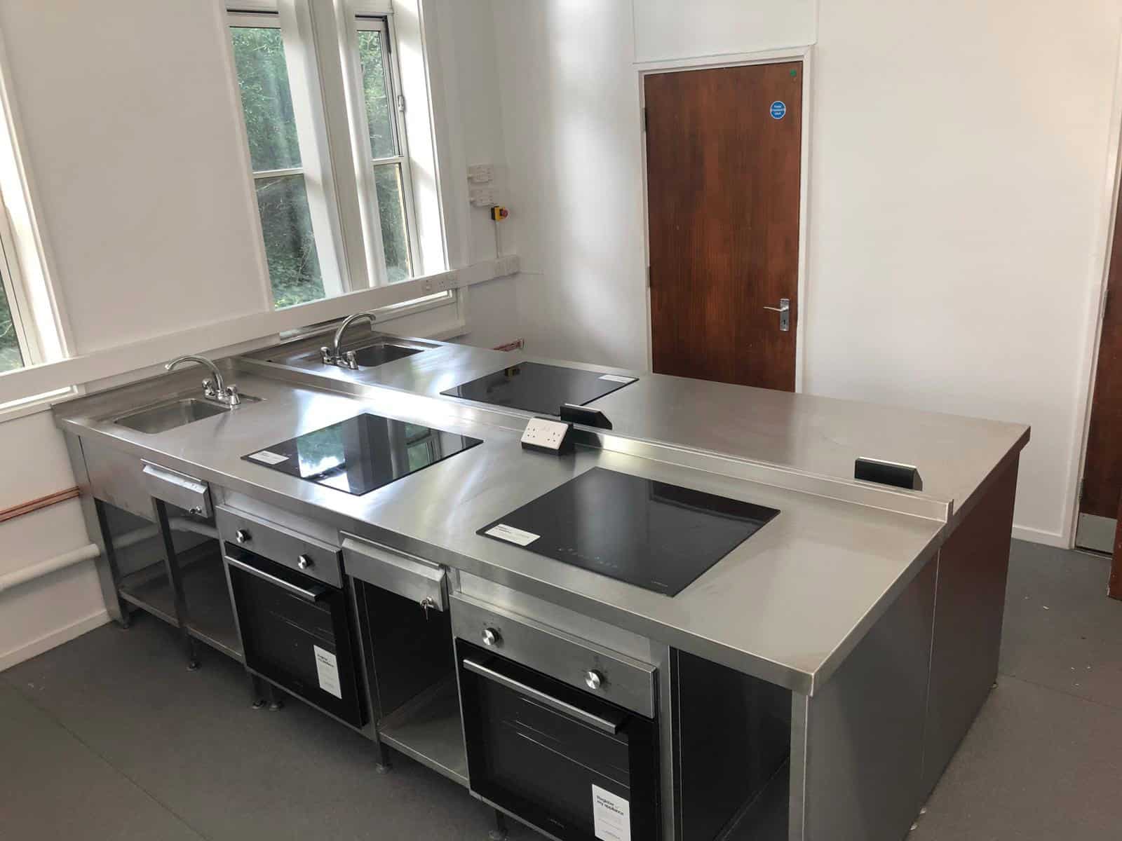 Island induction cooking station in the Southwood Centre teaching kitchen