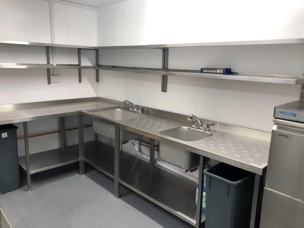 Stainless steel sink run and wall shelving at St Michaels Care, Westgate