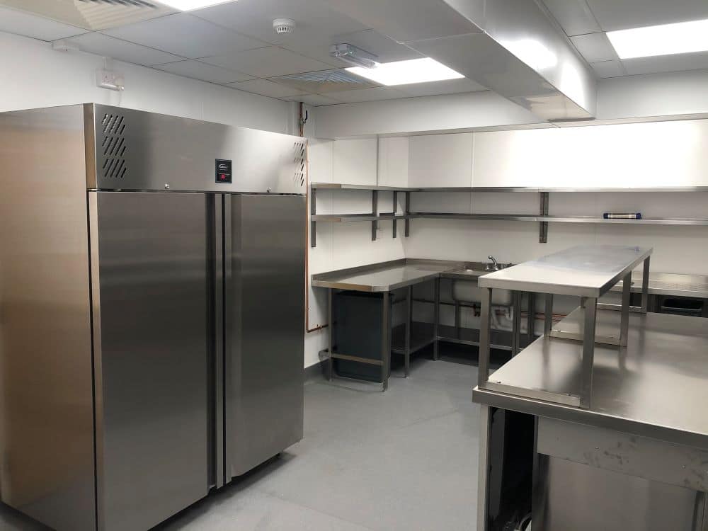 Upright refrigeration and prep area at St Michaels Care kitchen
