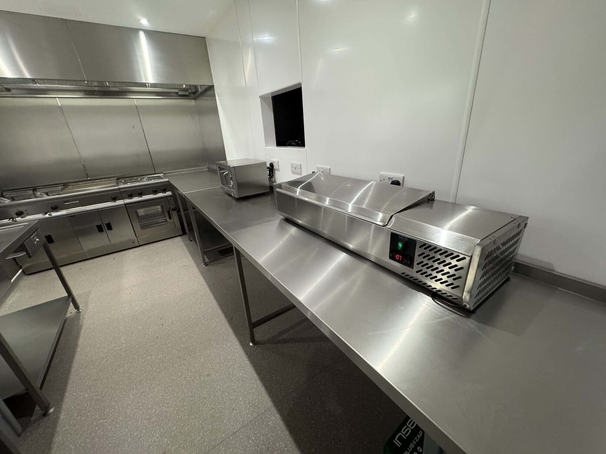 The Coffee Club, Manston \u2014 production kitchen with stainless steel prep tables