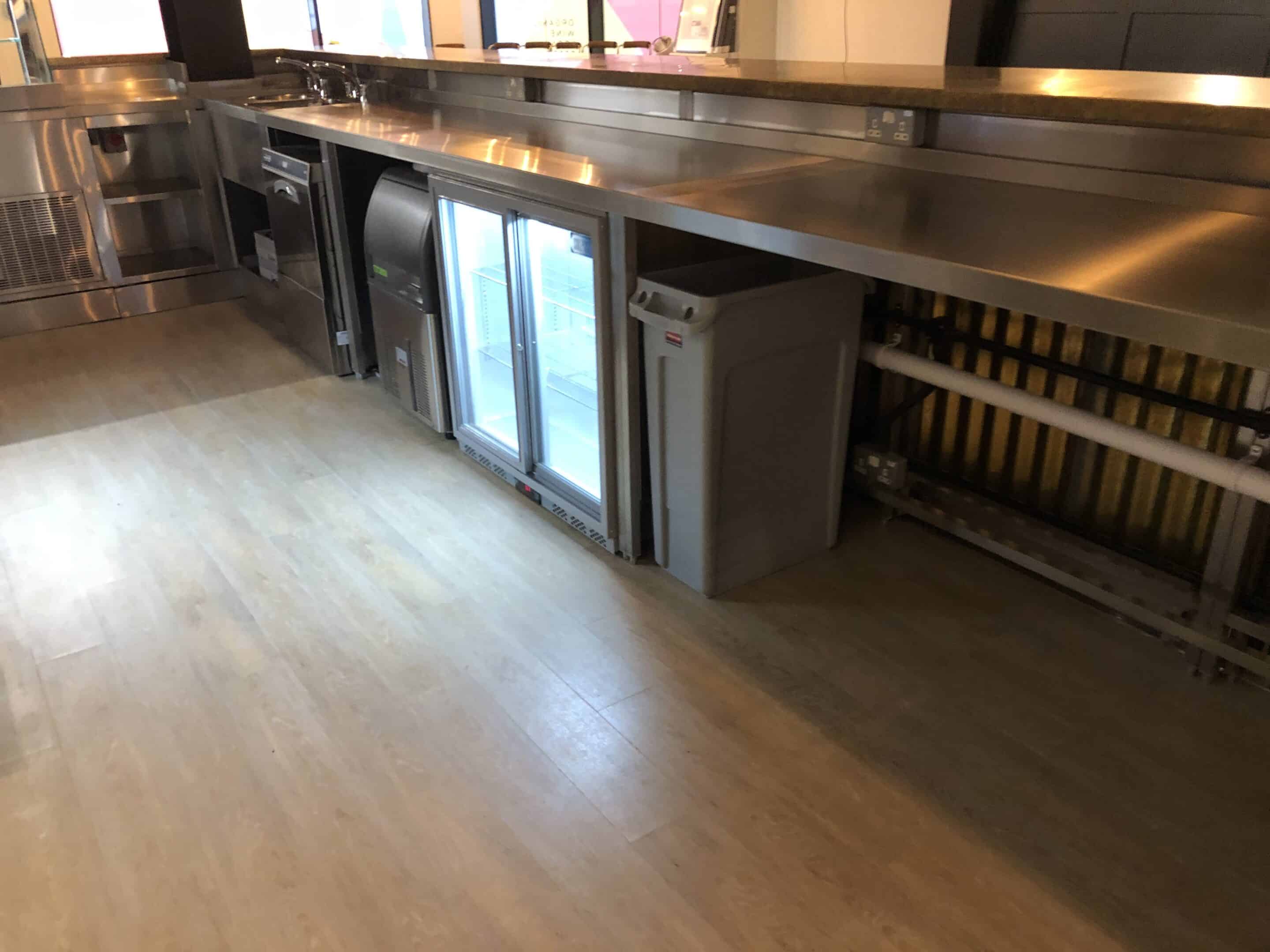 Bar back counter with bottle fridge at Unita Quattro, Ashford