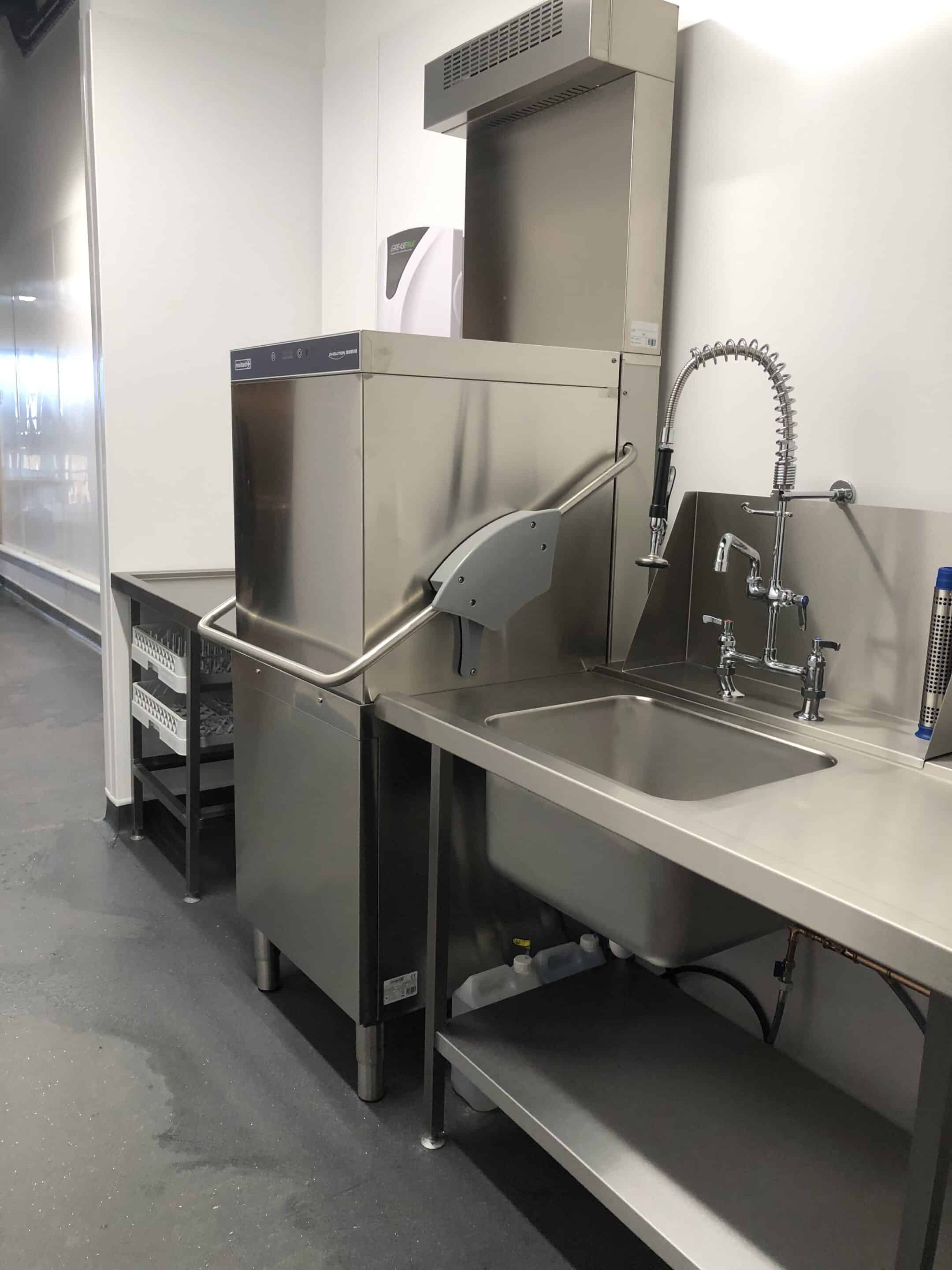 Wash-up area with hood dishwasher at Unita Quattro, Ashford